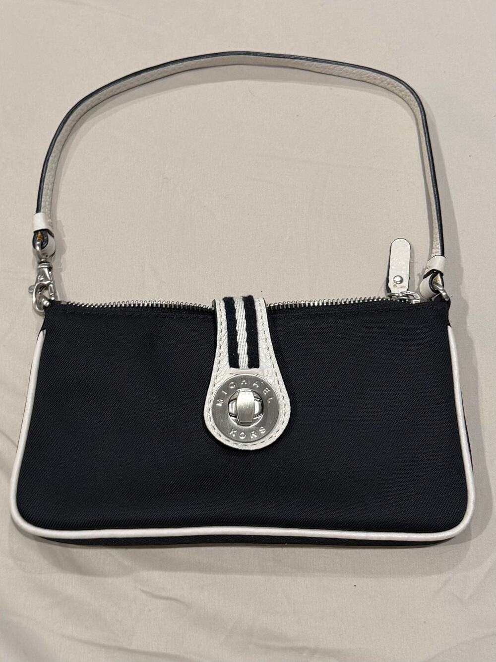 Michael Kors Black Canvas, leather trim and handle Wristlet